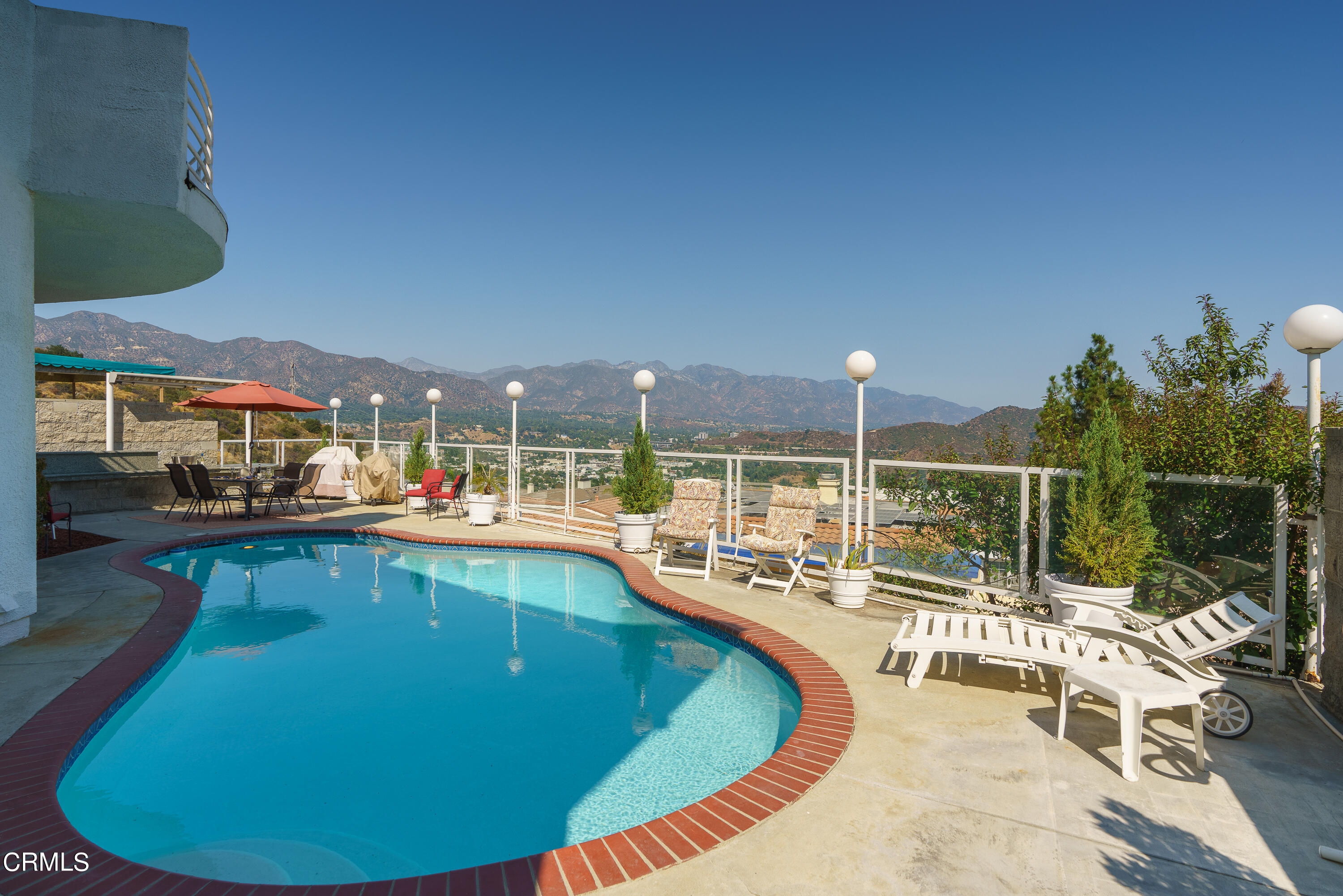 3336 Stephens Circle Glendale, CA 91208 - Photo 70 of 74 a view of a swimming pool with outdoor seating