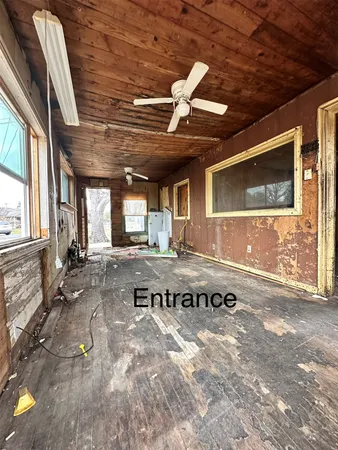 a view of a livingroom with furniture