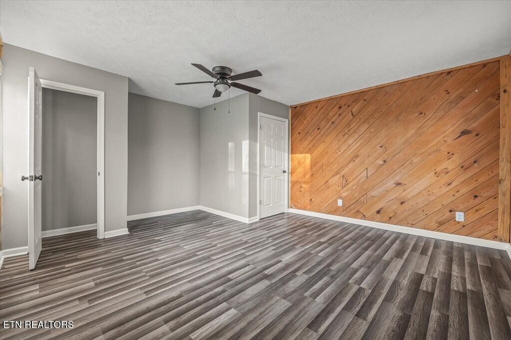 518 Flatt Spur Road Jamestown, TN 38556 - Photo 24 of 30 a view of empty room with wooden floor