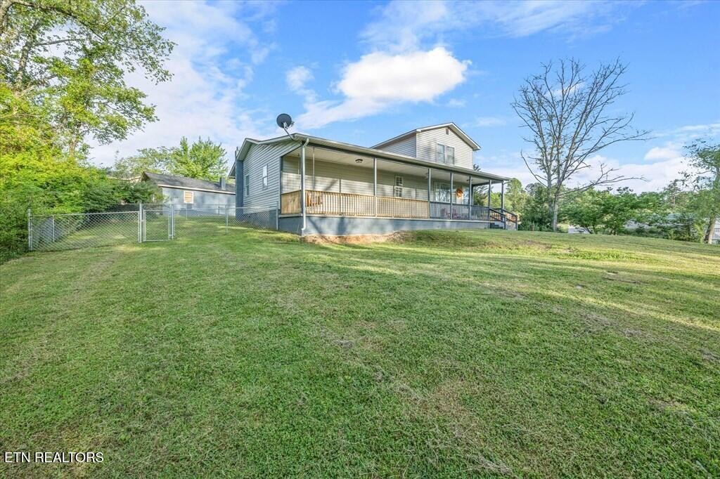518 Flatt Spur Road Jamestown, TN 38556 - Photo 5 of 30 a front view of house with yard and green space