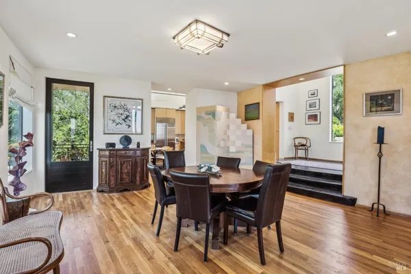 a kitchen with stainless steel appliances a sink and a large window