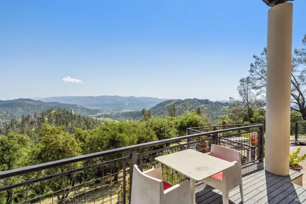 a view of a terrace with couches and a table