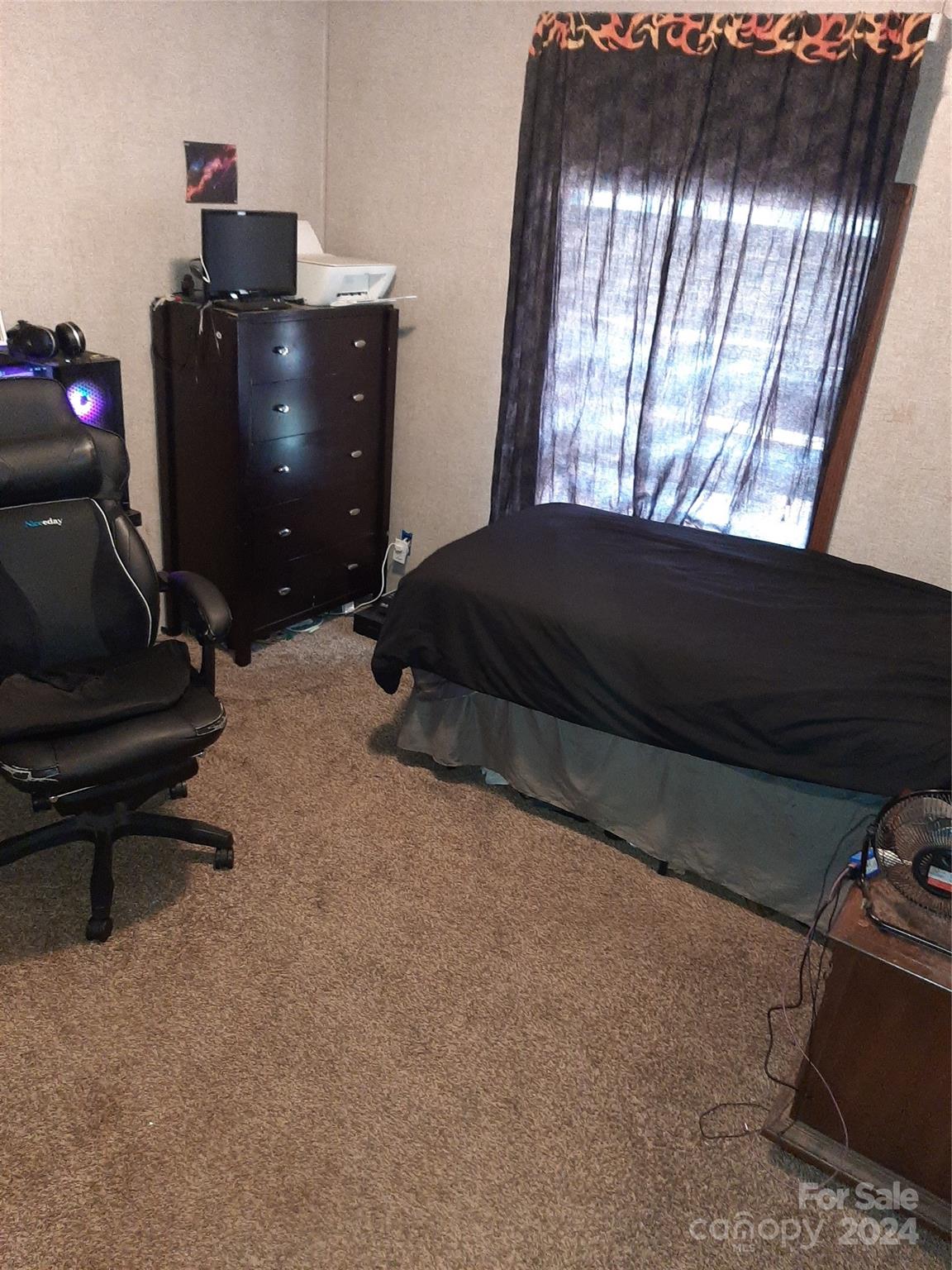 5059 Cabal Road Sharon, SC 29742 - Photo 21 of 36 a bedroom with a bed and window