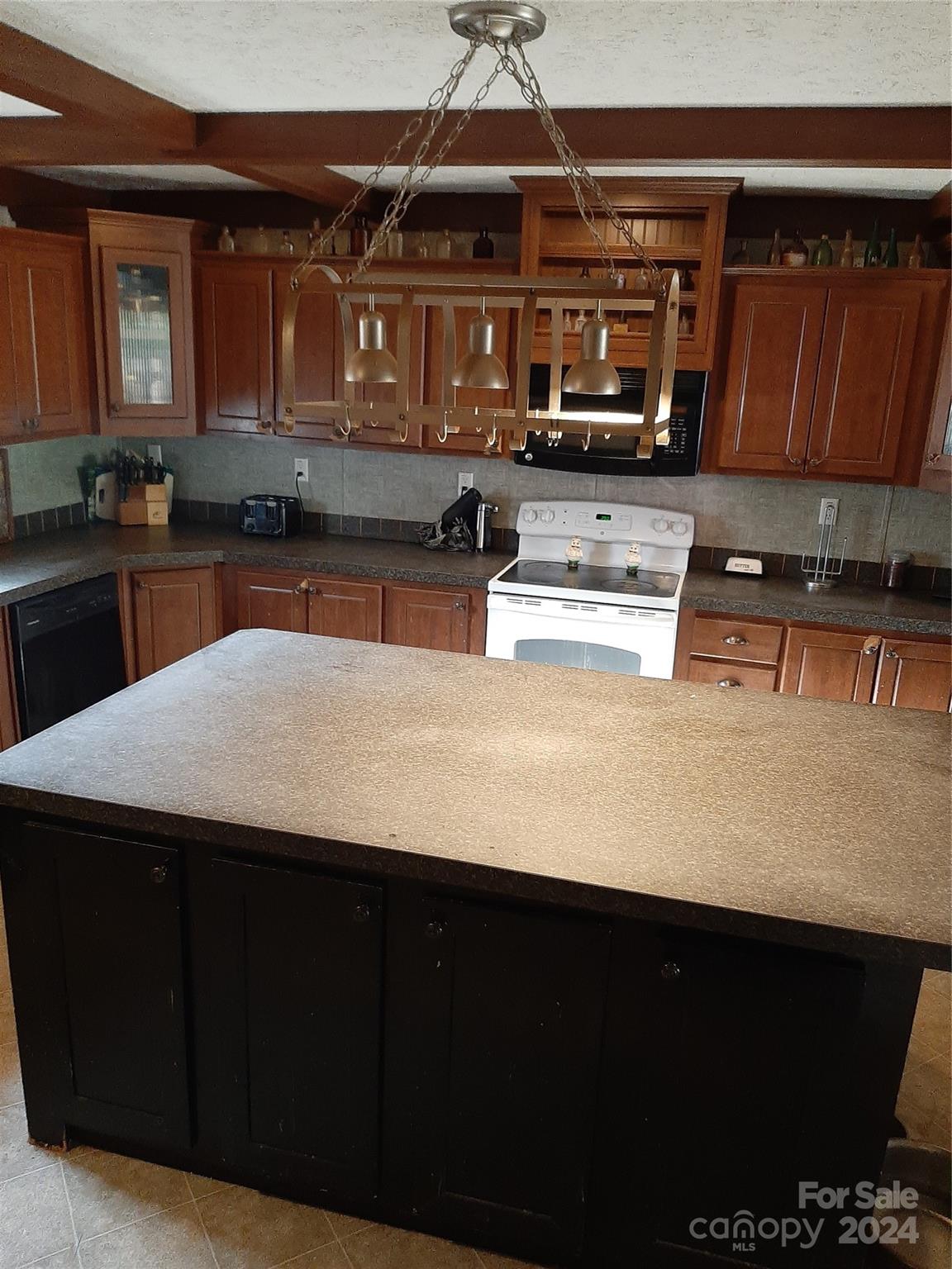 5059 Cabal Road Sharon, SC 29742 - Photo 3 of 36 a kitchen with stainless steel appliances wooden cabinets and a sink