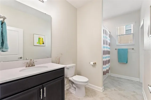 a view of a house with a big yard