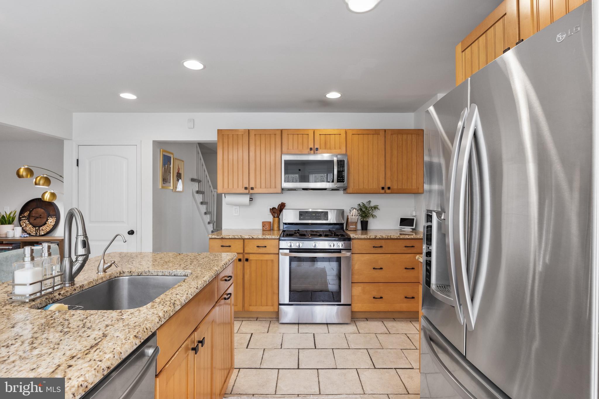 13 Mallard Drive Tabernacle, NJ 08088 - Photo 13 of 54 a kitchen with stainless steel appliances granite countertop a sink stove and refrigerator