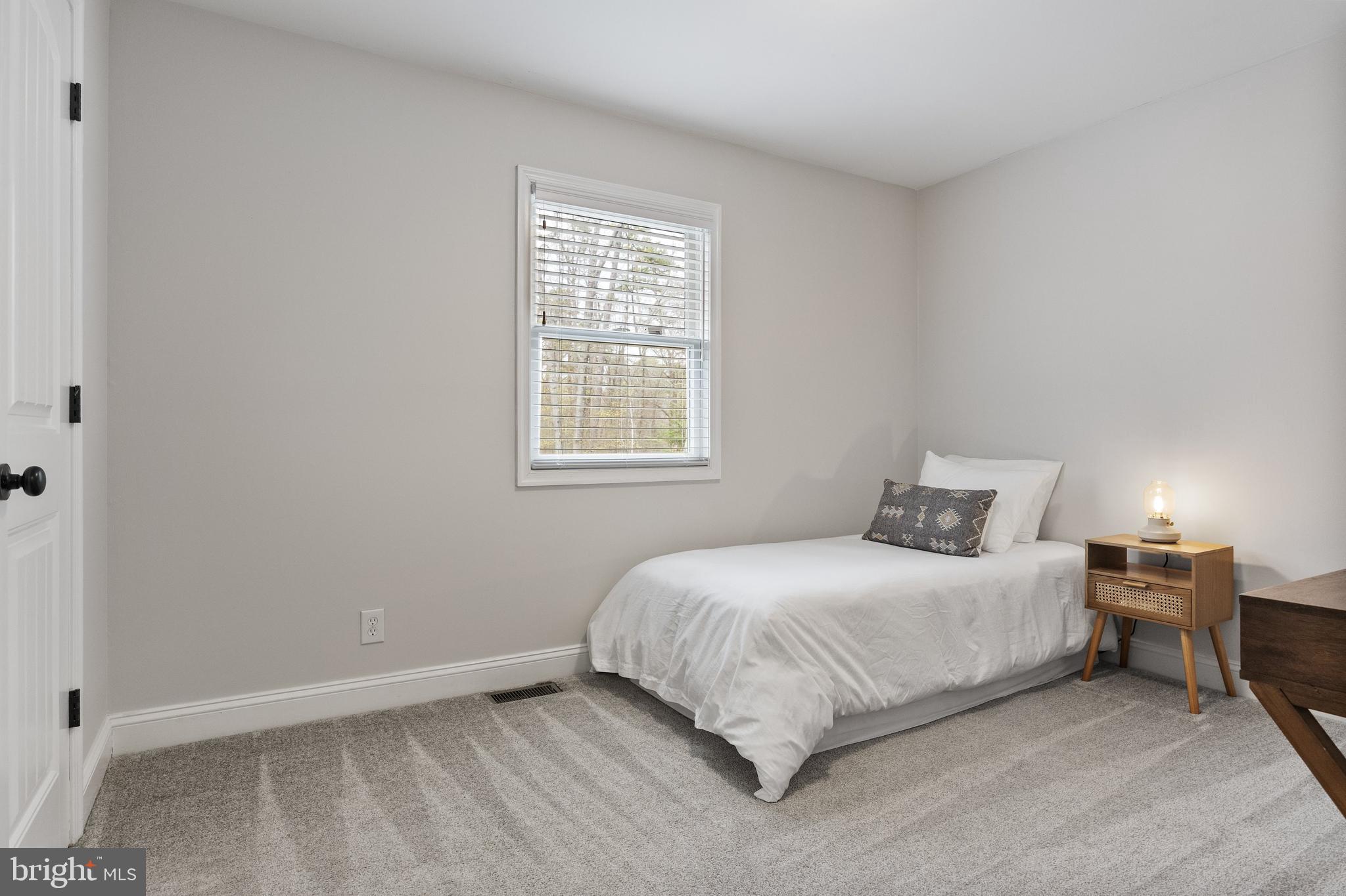 13 Mallard Drive Tabernacle, NJ 08088 - Photo 24 of 54 a bedroom with a bed and a window