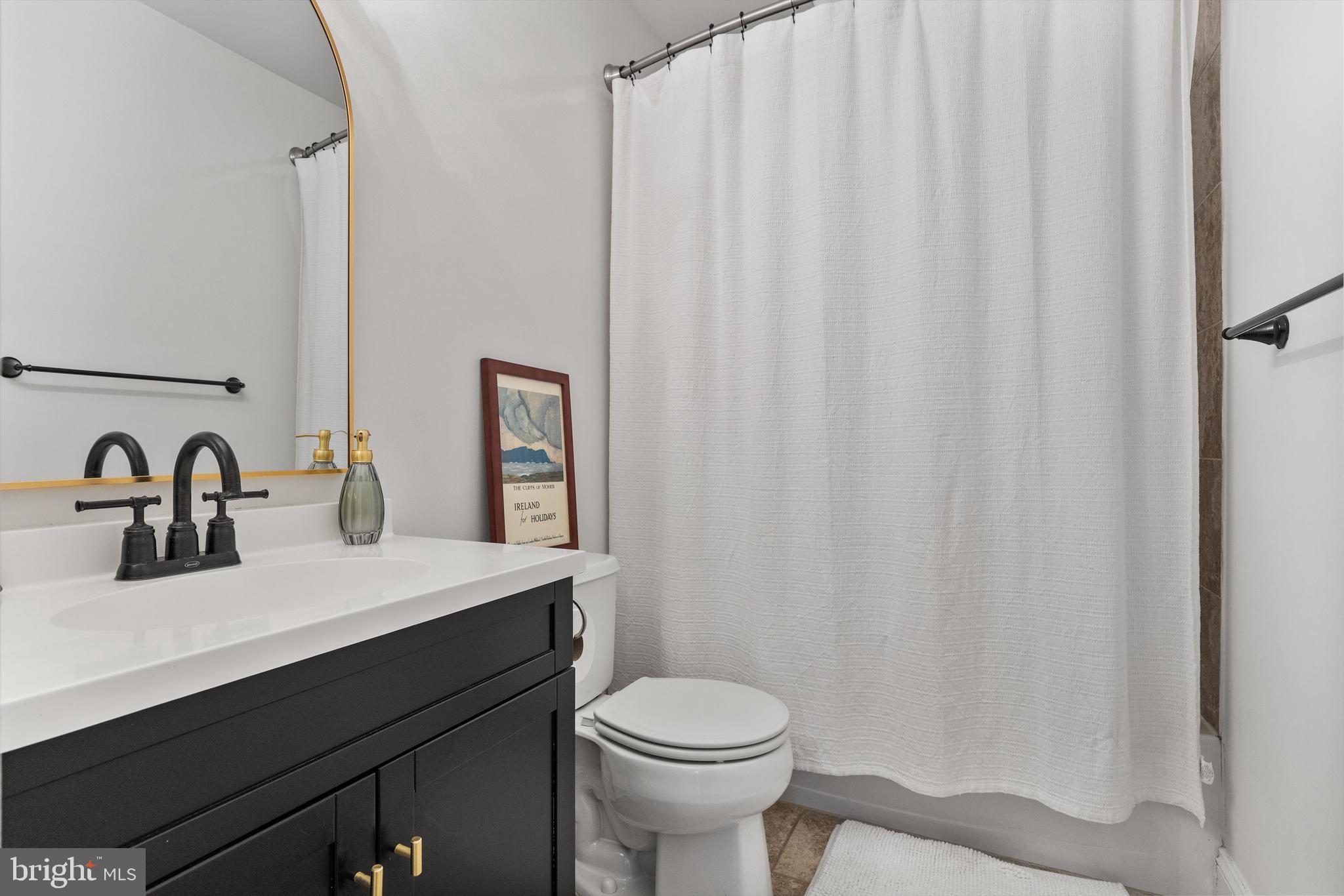 13 Mallard Drive Tabernacle, NJ 08088 - Photo 27 of 54 a bathroom with a sink a toilet and a mirror