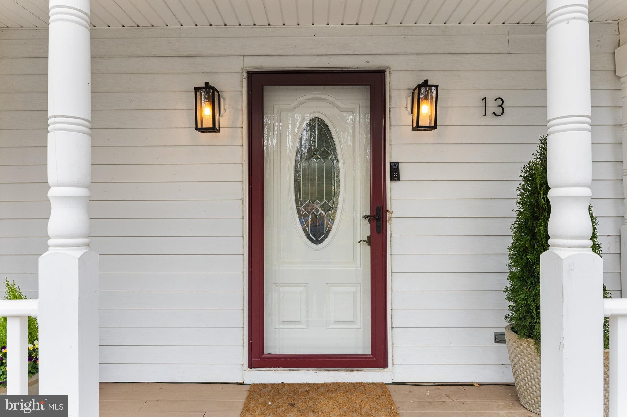 13 Mallard Drive Tabernacle, NJ 08088 - Photo 3 of 54 a view of a door of the house with a potted plant