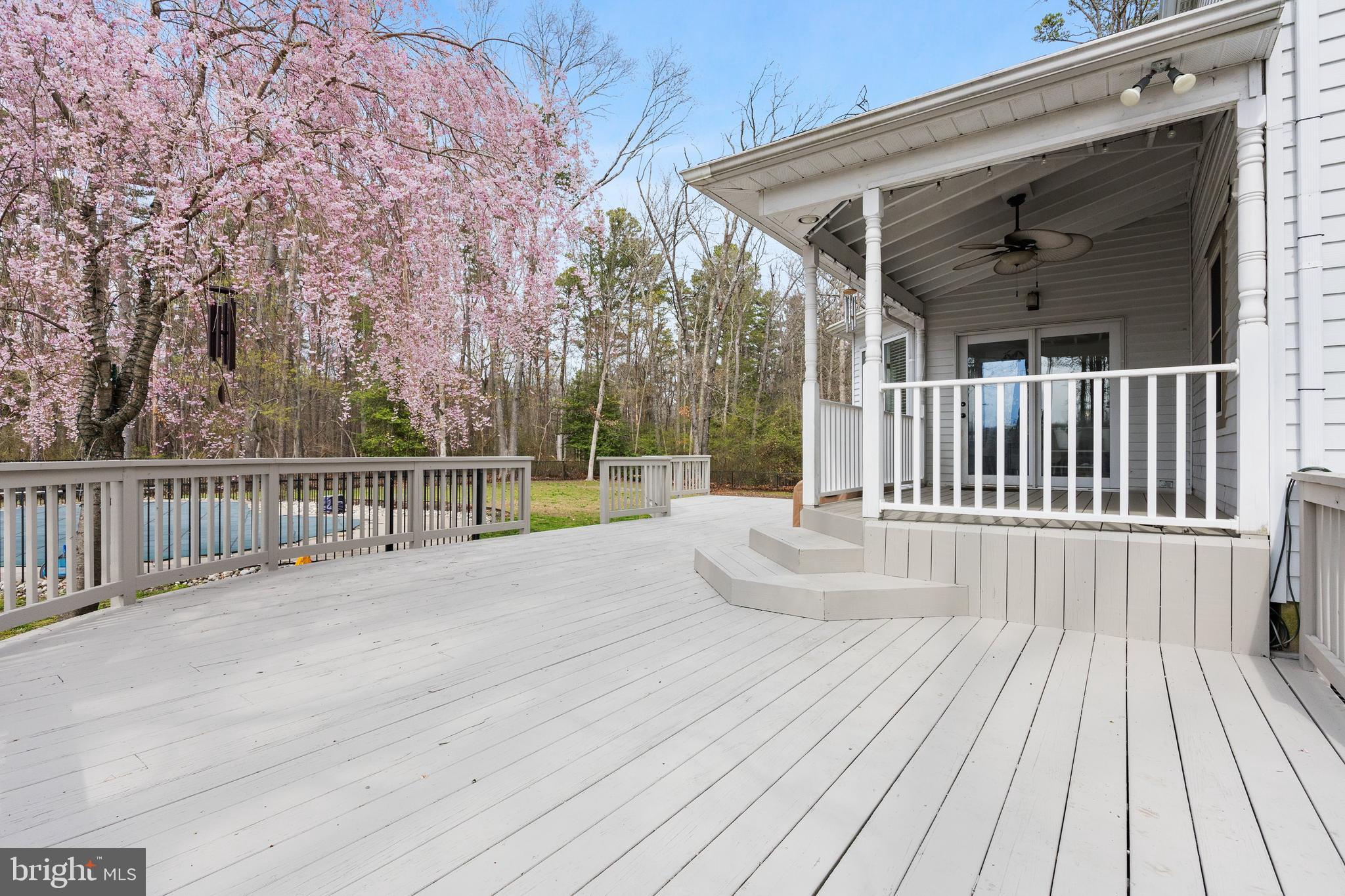 13 Mallard Drive Tabernacle, NJ 08088 - Photo 32 of 54 a view of backyard with deck and wooden floor