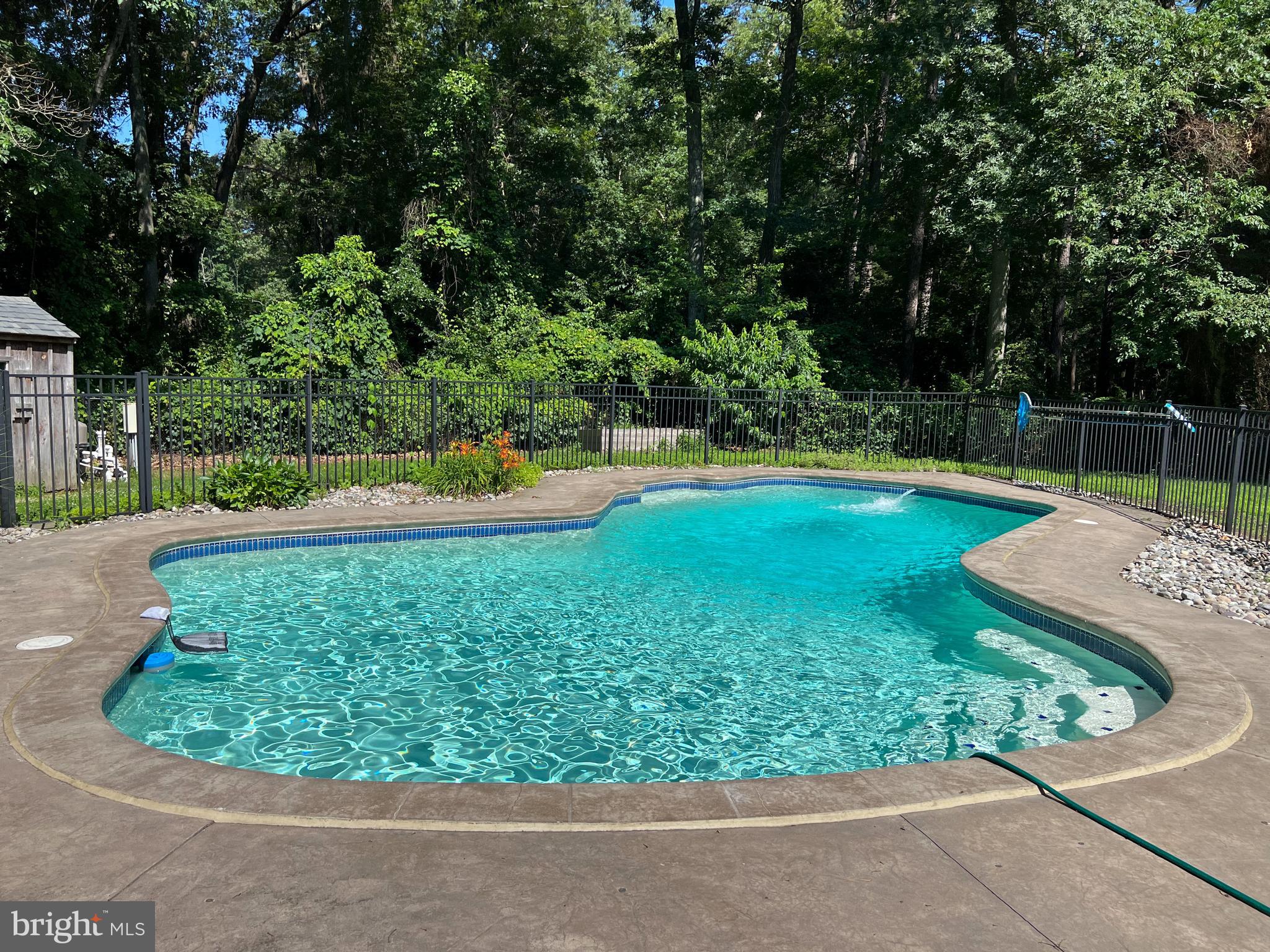 13 Mallard Drive Tabernacle, NJ 08088 - Photo 37 of 54 a view of a backyard with swimming pool