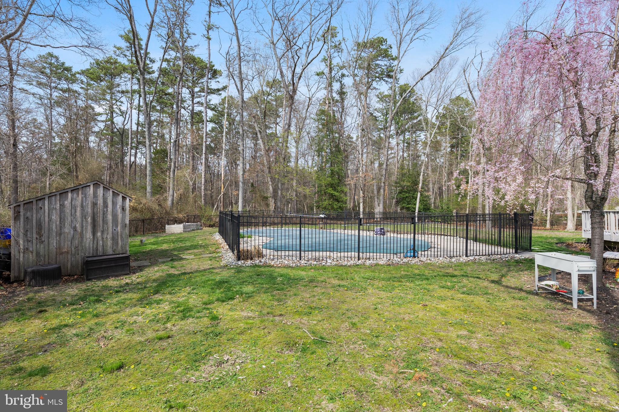 13 Mallard Drive Tabernacle, NJ 08088 - Photo 38 of 54 a view of a backyard with a trampoline