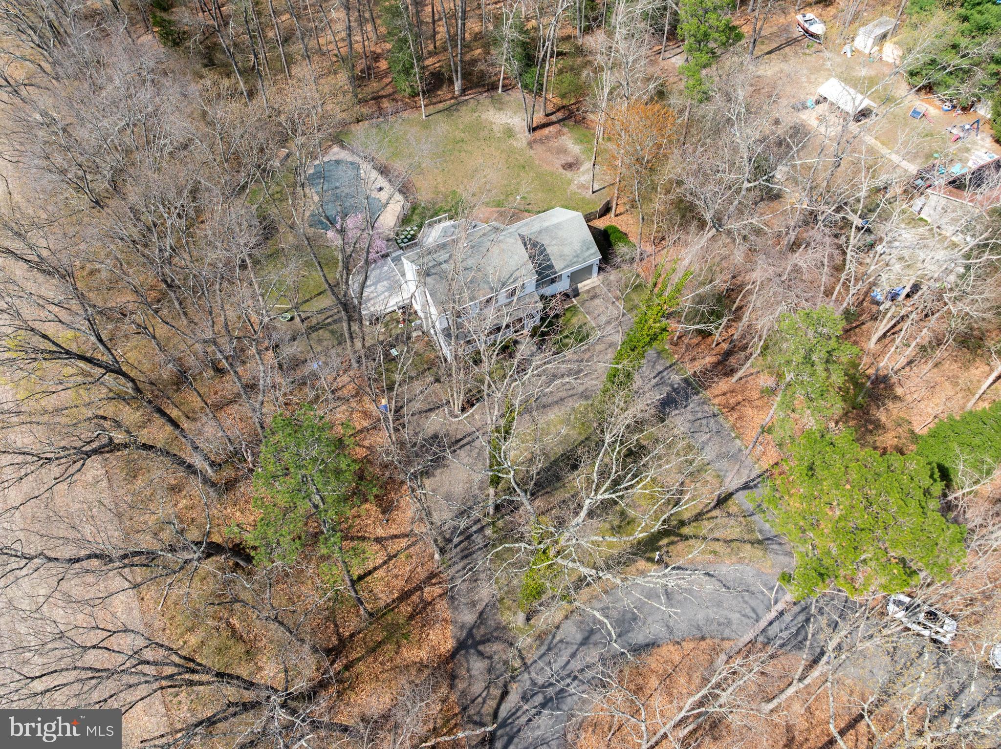 13 Mallard Drive Tabernacle, NJ 08088 - Photo 45 of 54 a backyard of a house with a yard and outdoor seating