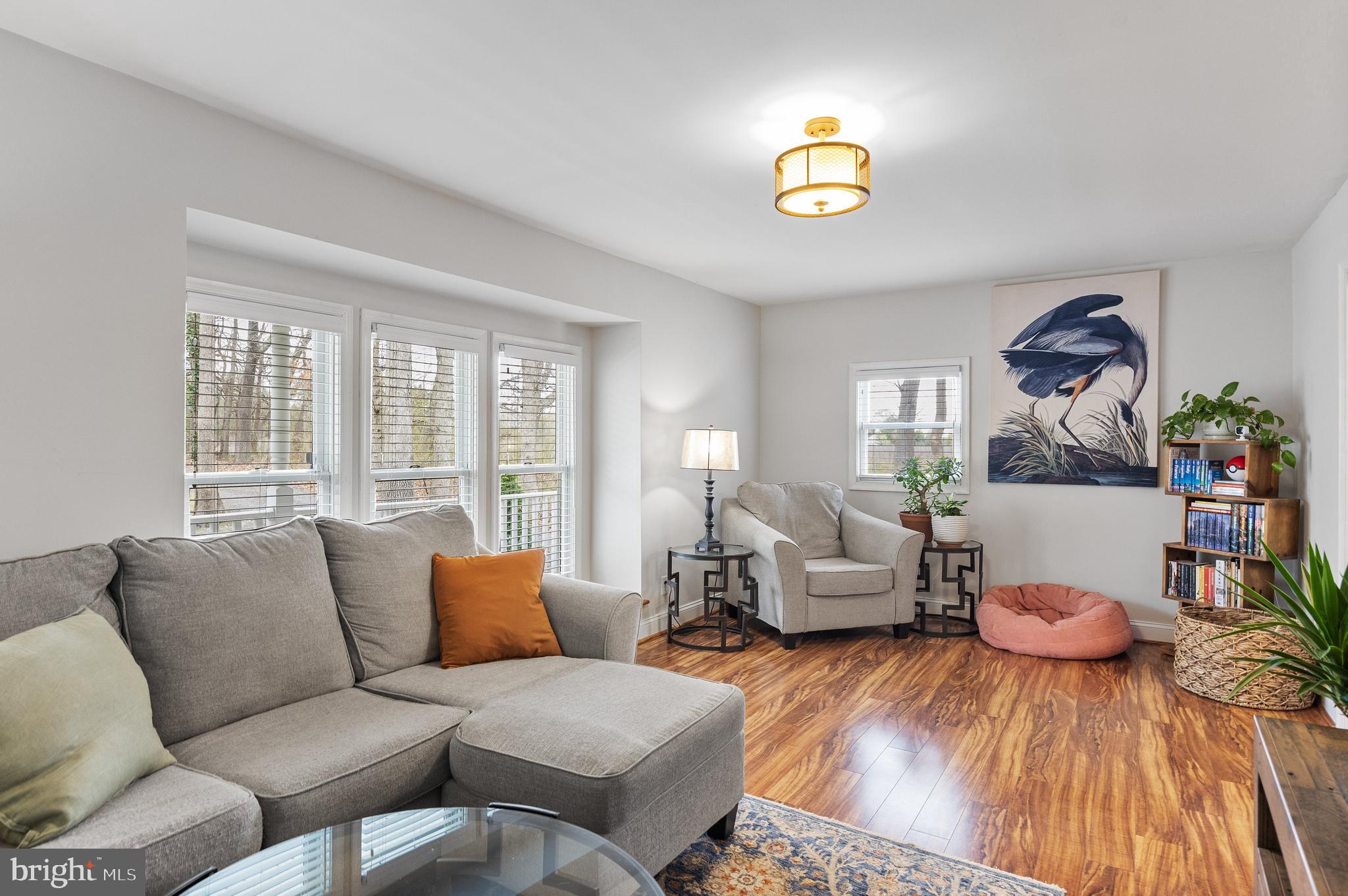 13 Mallard Drive Tabernacle, NJ 08088 - Photo 7 of 54 a living room with furniture and a chandelier
