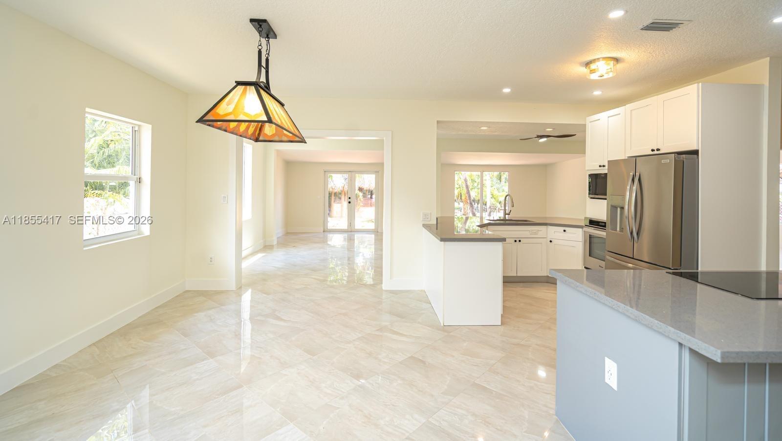 2810 Southwest 114th Avenue Miami, FL 33165 - Photo 7 of 62 a view of a kitchen with refrigerator and a sink