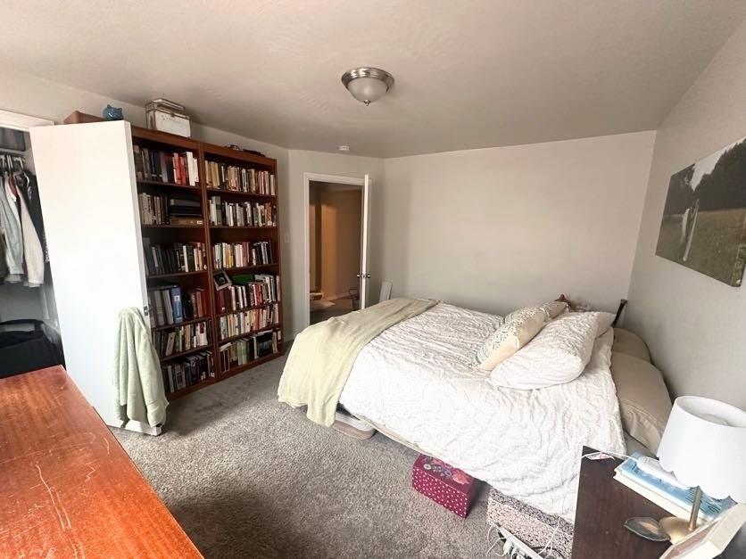 1035 State Avenue Coraopolis, PA 15108 - Photo 5 of 6 a bed sitting in a bedroom next to a book shelf