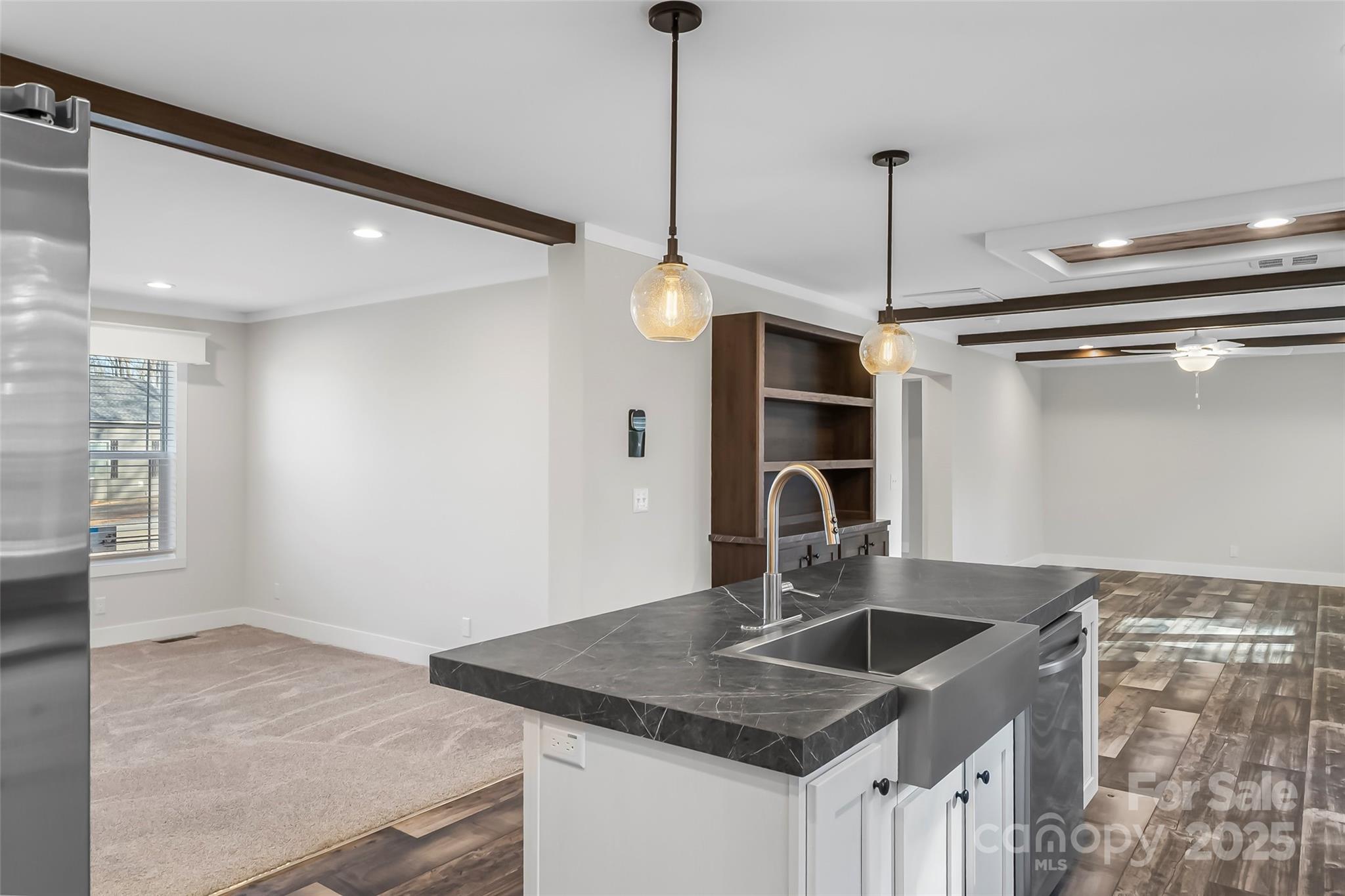 209 Walnut Br Road Weaverville, NC 28787 - Photo 14 of 43 a kitchen with a sink a counter space and a sink