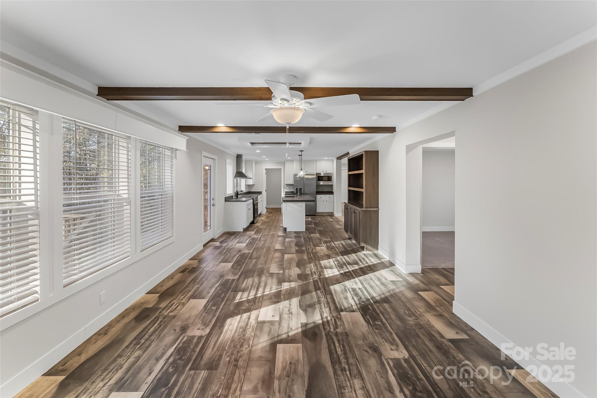 209 Walnut Br Road Weaverville, NC 28787 - Photo 15 of 43 a view of a living room with wooden floor