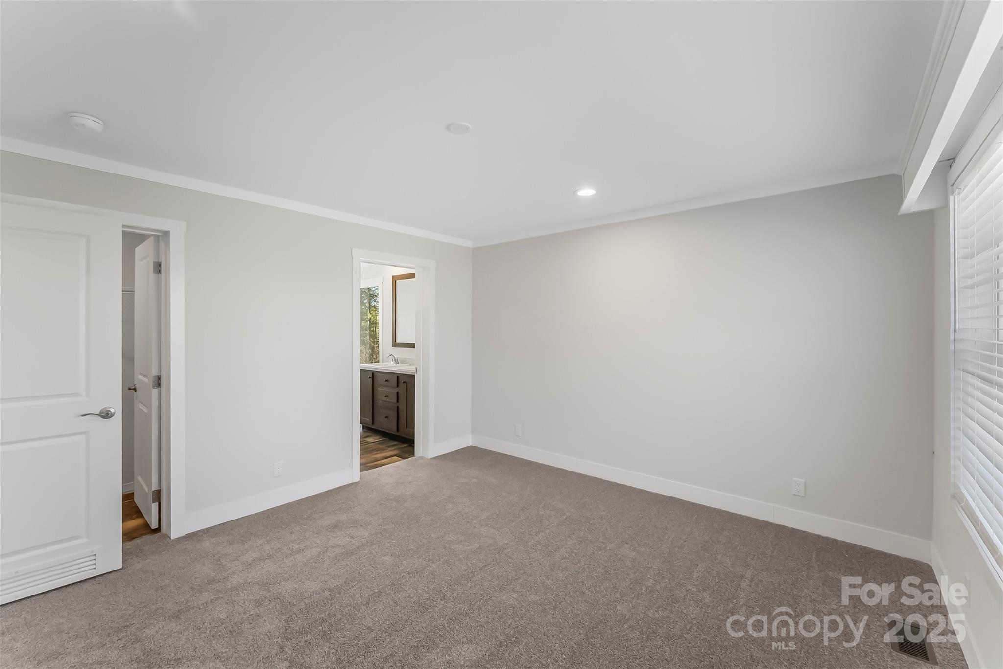 209 Walnut Br Road Weaverville, NC 28787 - Photo 19 of 43 an empty room with windows