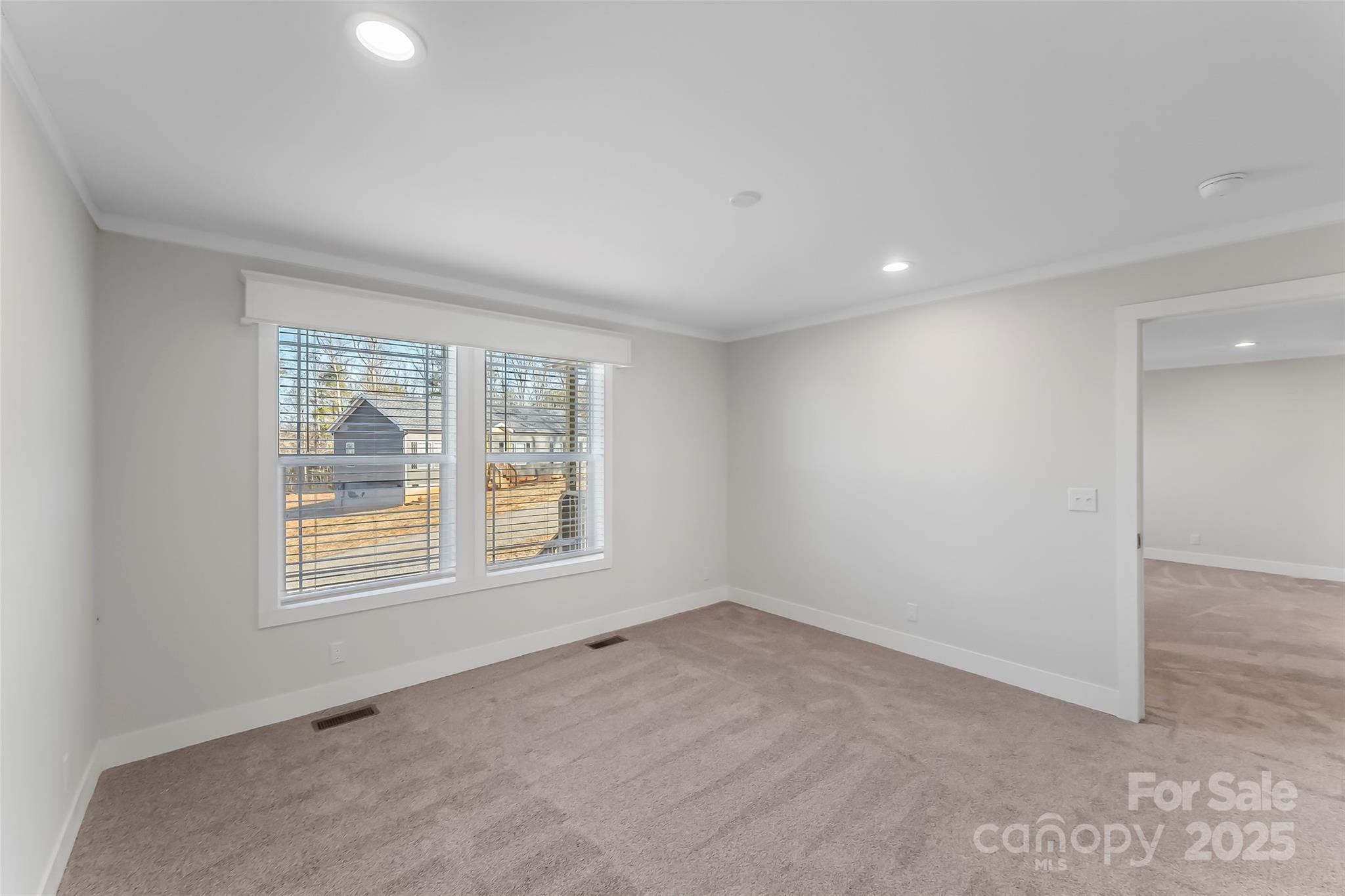 209 Walnut Br Road Weaverville, NC 28787 - Photo 20 of 43 a view of an empty room with a window