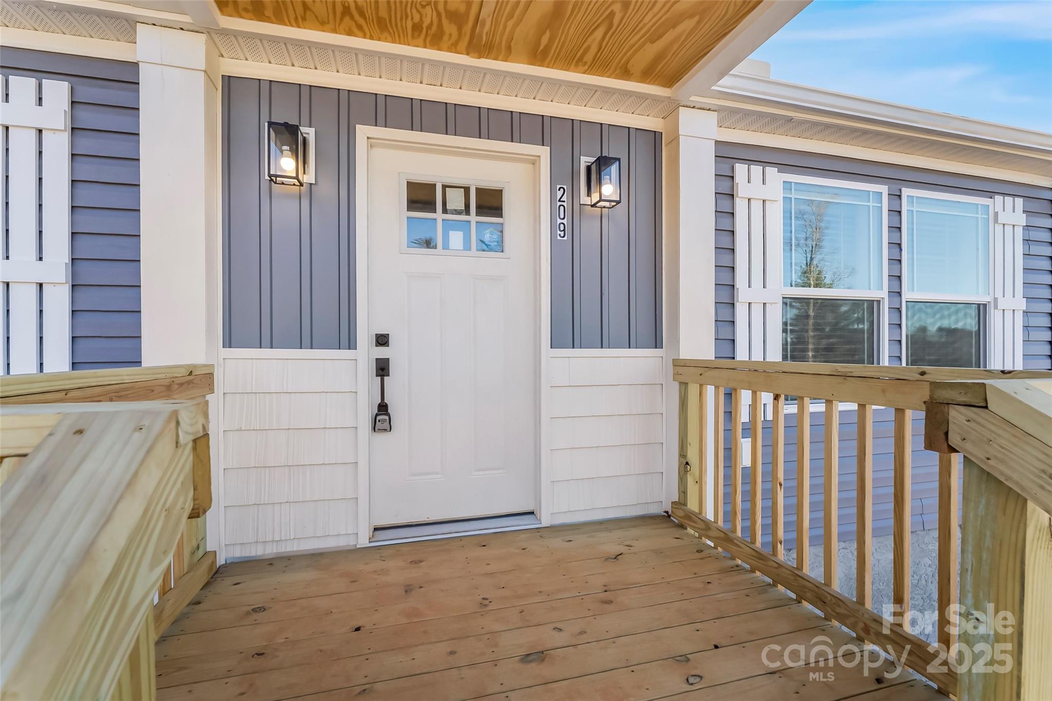 209 Walnut Br Road Weaverville, NC 28787 - Photo 2 of 43 front view of a house with an empty space