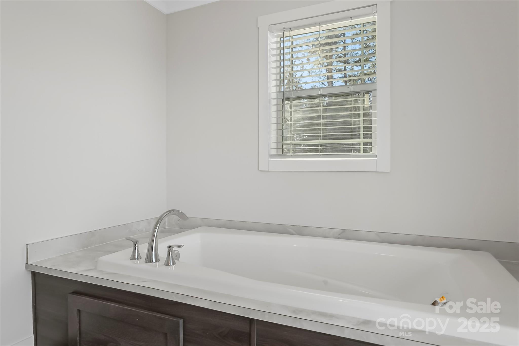 209 Walnut Br Road Weaverville, NC 28787 - Photo 23 of 43 a bathroom with a granite countertop sink and a vanity
