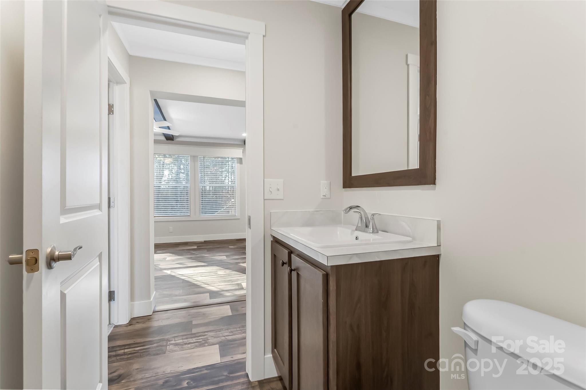 209 Walnut Br Road Weaverville, NC 28787 - Photo 30 of 43 a bathroom with a granite countertop sink toilet and shower