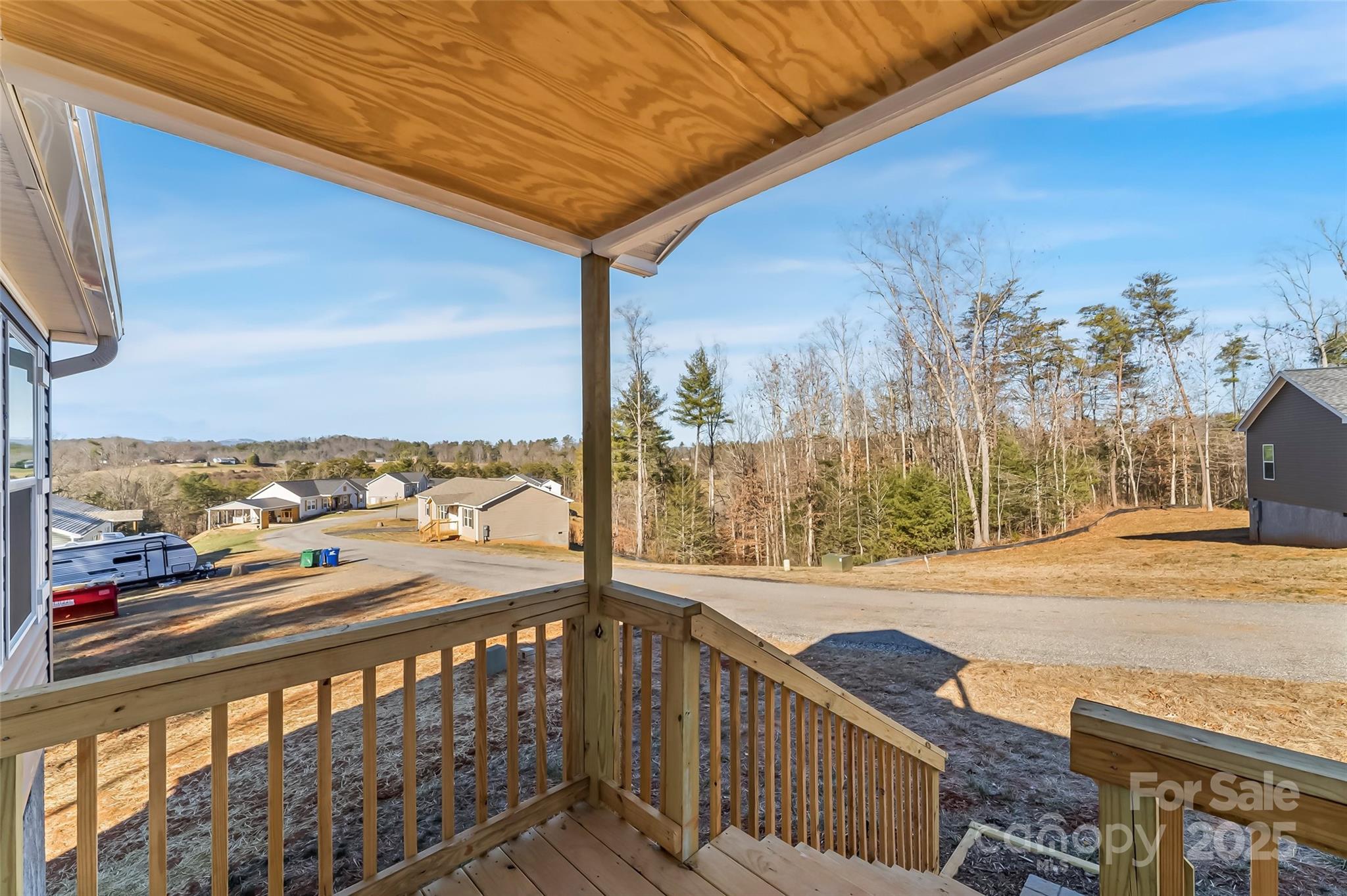 209 Walnut Br Road Weaverville, NC 28787 - Photo 3 of 43 a view of a city from a balcony