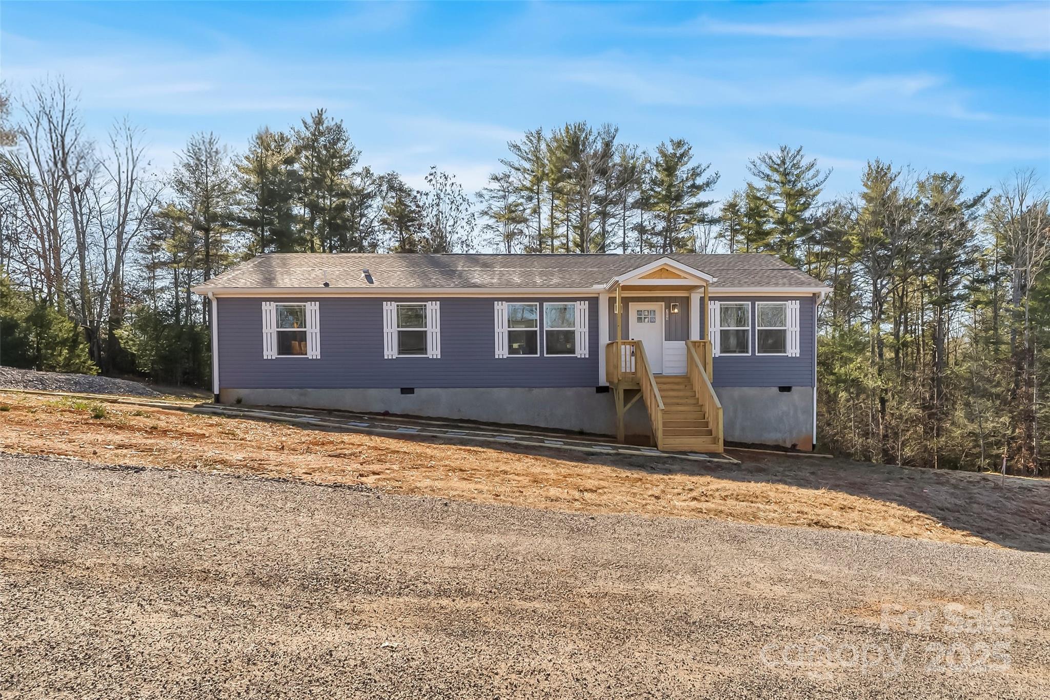 209 Walnut Br Road Weaverville, NC 28787 - Photo 42 of 43 a view of a house with a yard
