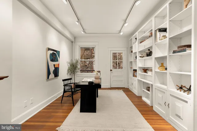 a living room with furniture and view of living room