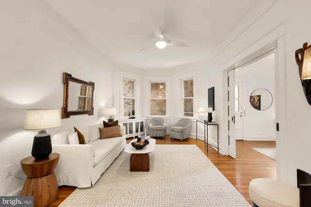 a kitchen with stainless steel appliances kitchen island granite countertop a sink and cabinets