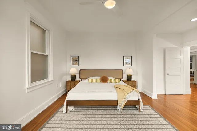 a bathroom with a toilet a sink and shower