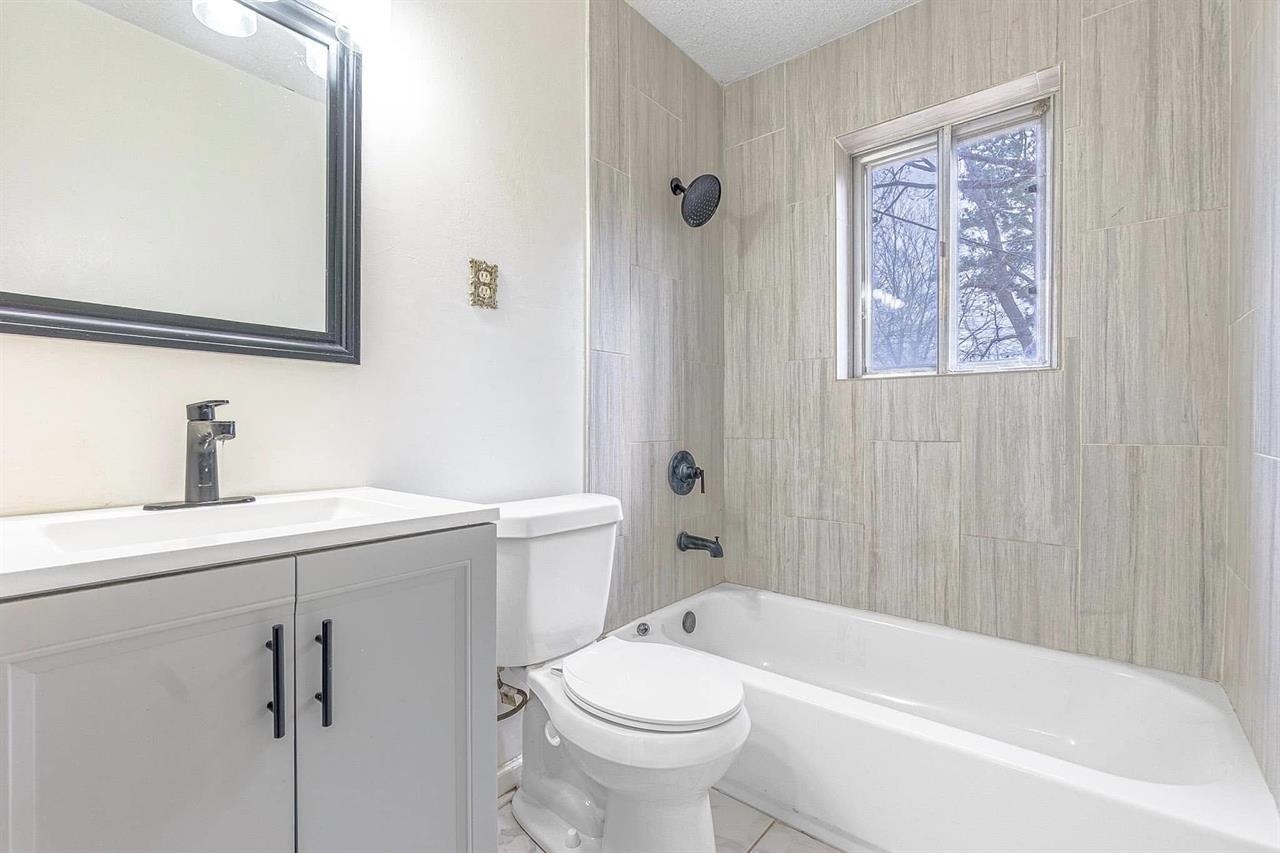 3837 Tessland Road Memphis, TN 38128 - Photo 11 of 12 a bathroom with a sink a toilet and shower