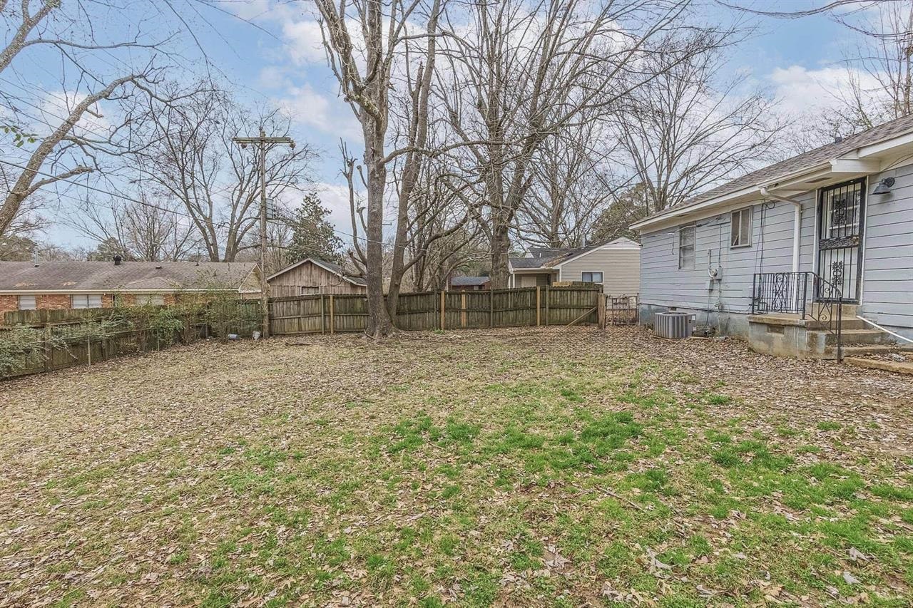 3837 Tessland Road Memphis, TN 38128 - Photo 12 of 12 a backyard of a house