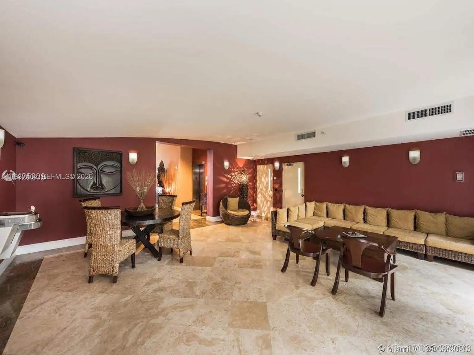 2730 Southwest 26th Street, Unit 2730 Miami, FL 33133 - Photo 23 of 24 a view of a livingroom with furniture and a fireplace