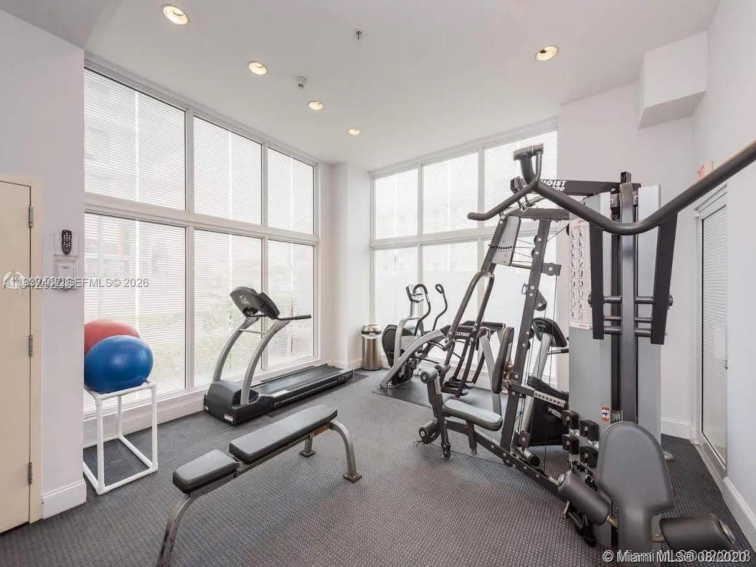 2730 Southwest 26th Street, Unit 2730 Miami, FL 33133 - Photo 24 of 24 a view of a room with gym equipment