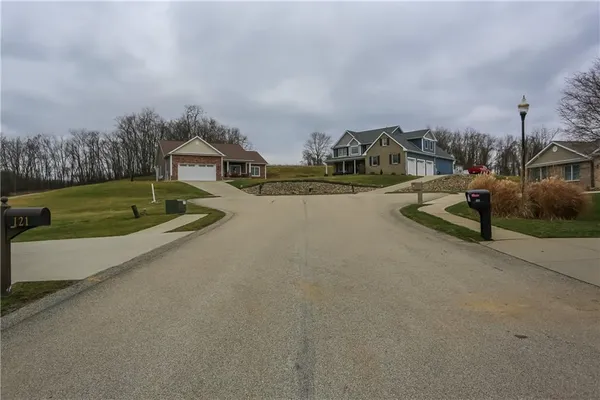 a view of a street with houses