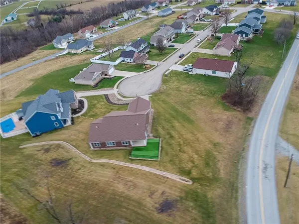a aerial view of a house with outdoor space