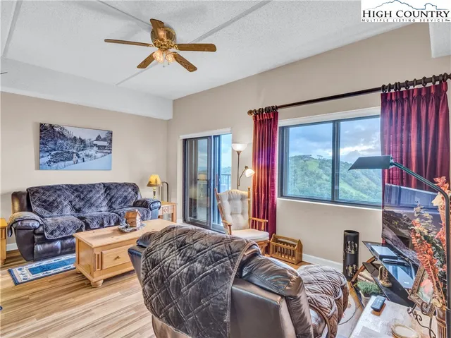 a view of a big yard with lots of green space and deers