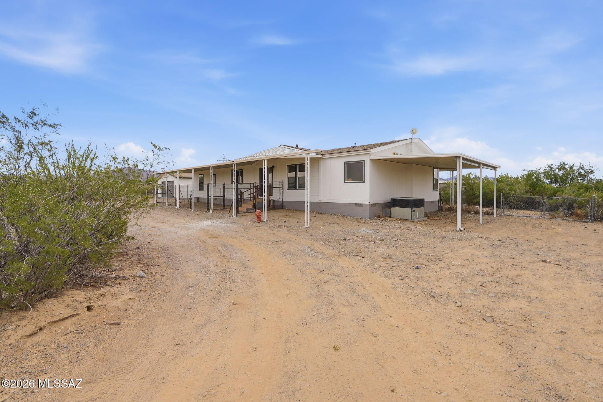 7716 West Sahuarita Road Vail, AZ 85641 - Photo 3 of 51 Driveway Up To Home