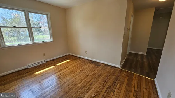 a bathroom with a sink a mirror and a toilet