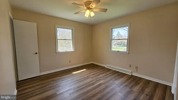 an empty room with windows