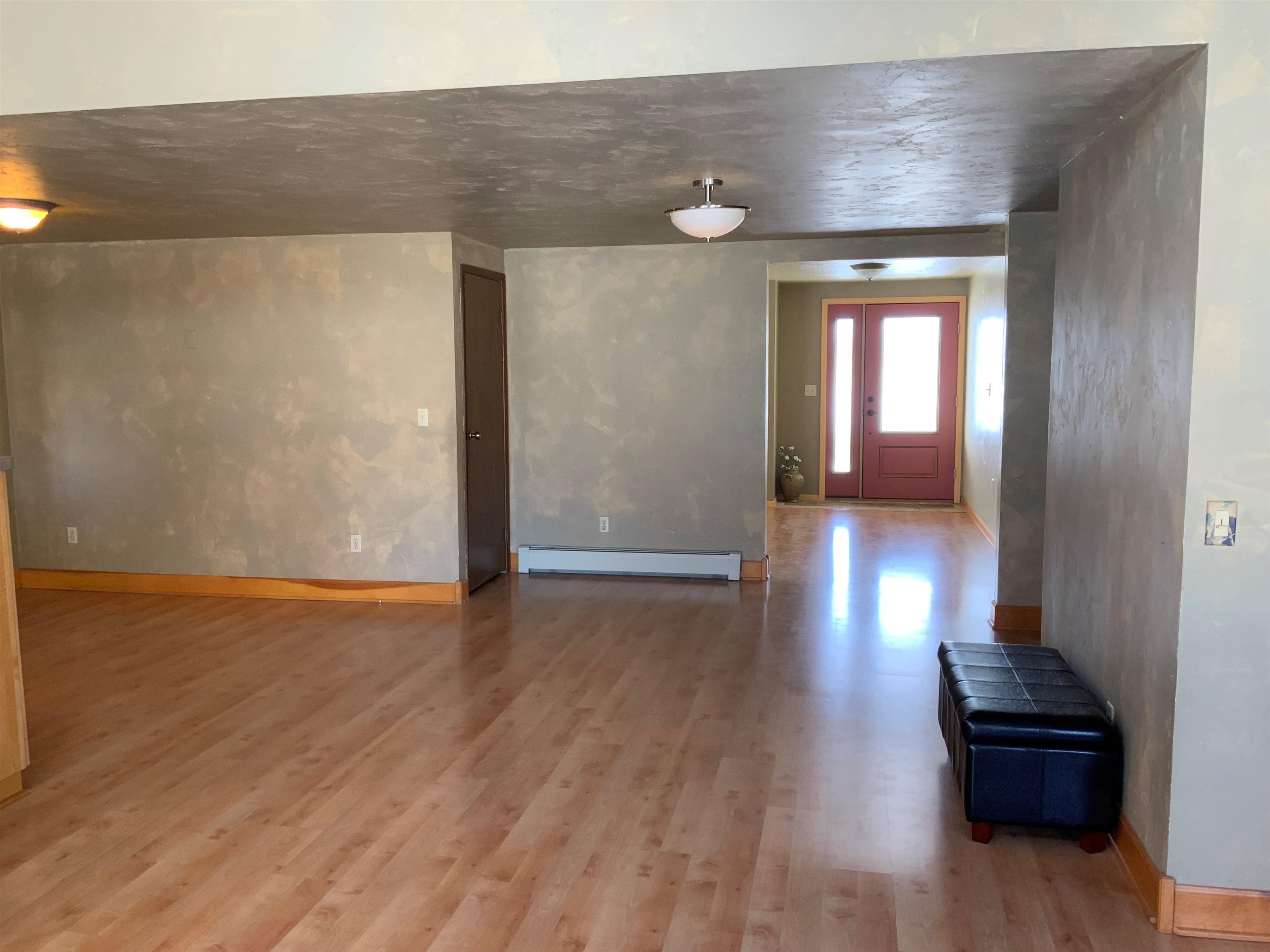734-36 36 3/10 Road Palisade, CO 81526 - Photo 12 of 39 a view of livingroom with furniture and wooden floor