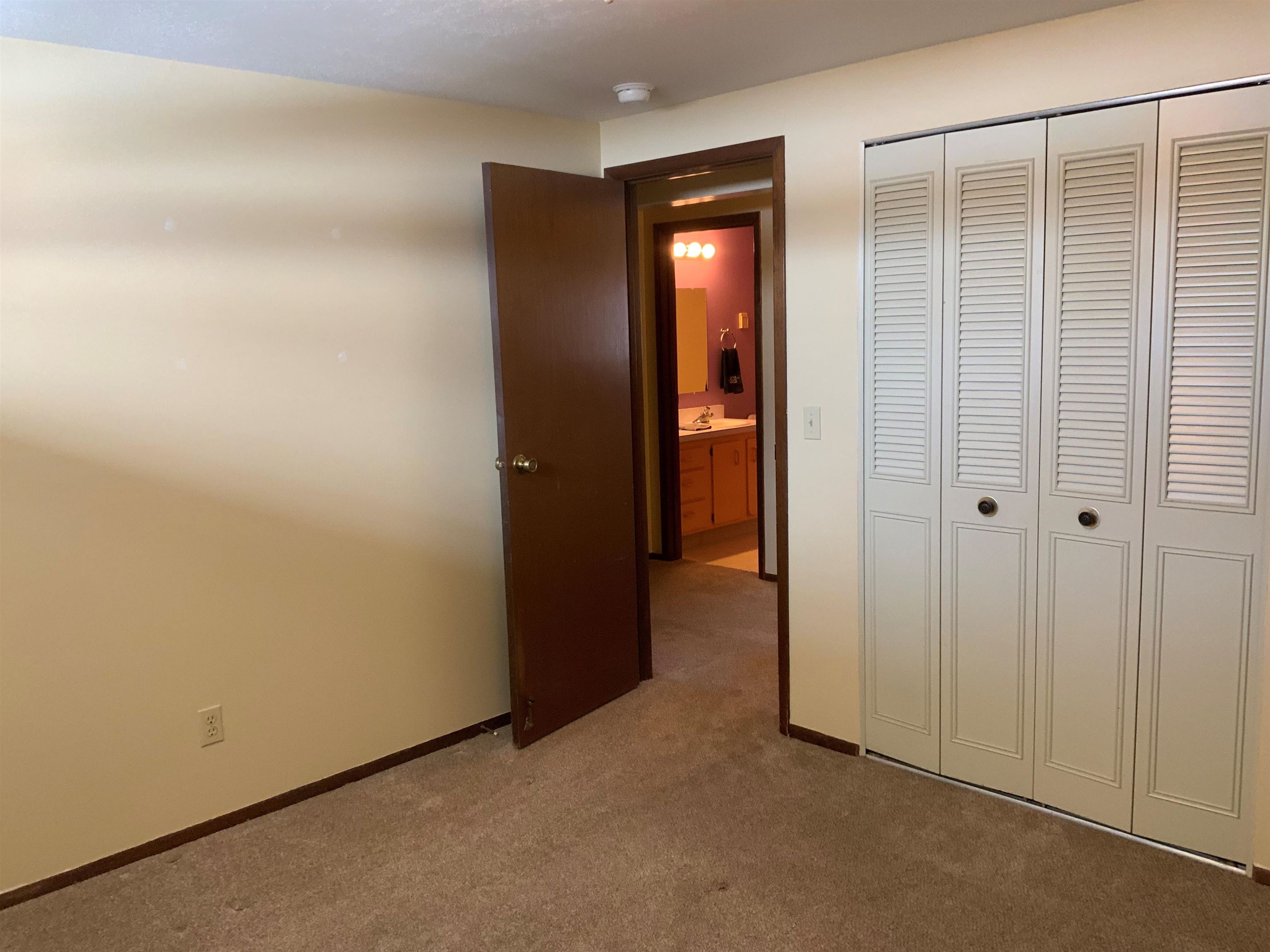734-36 36 3/10 Road Palisade, CO 81526 - Photo 17 of 39 an empty room with closet and a bathroom