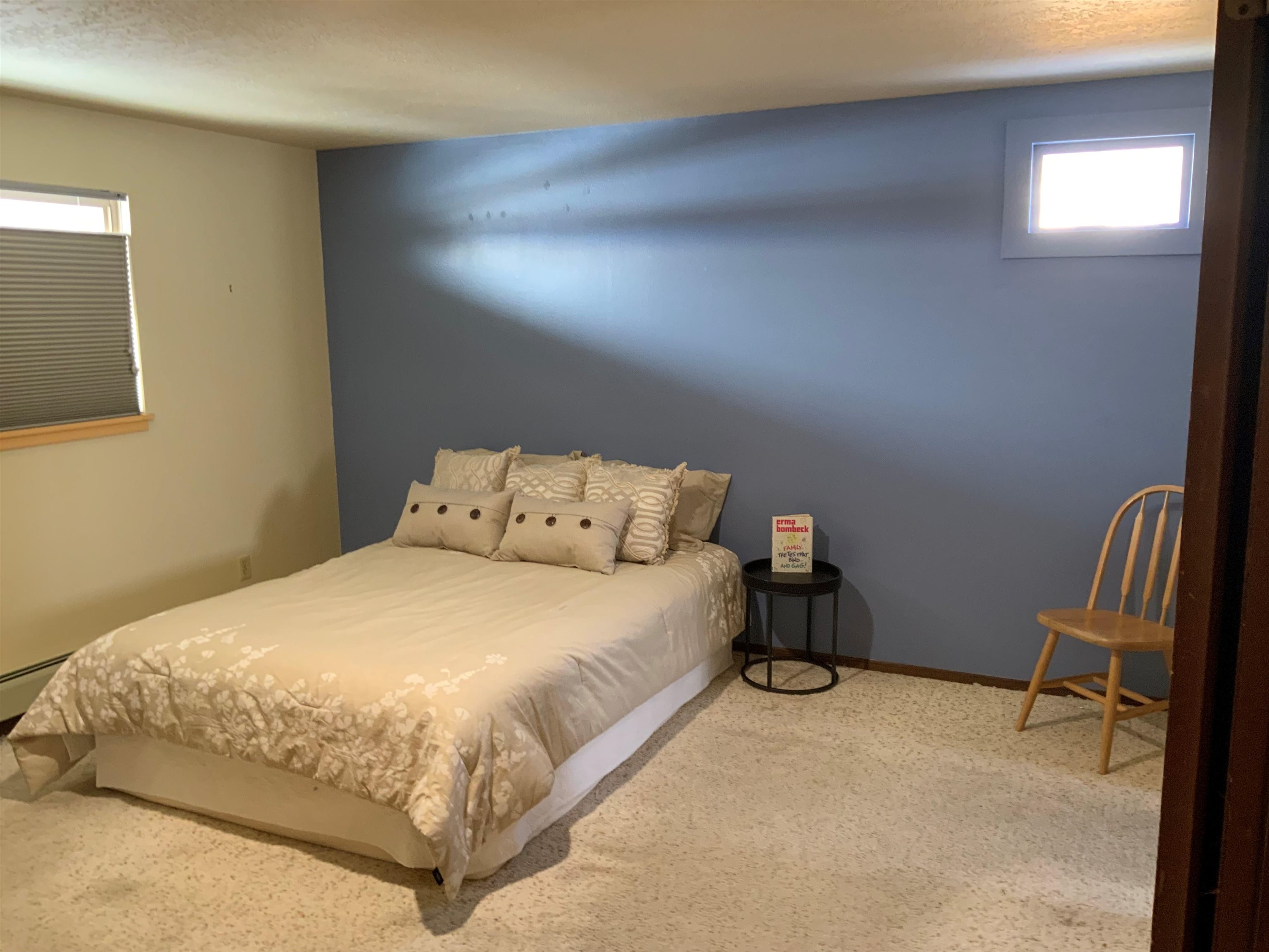 734-36 36 3/10 Road Palisade, CO 81526 - Photo 20 of 39 a bedroom with a bed a desk and chair