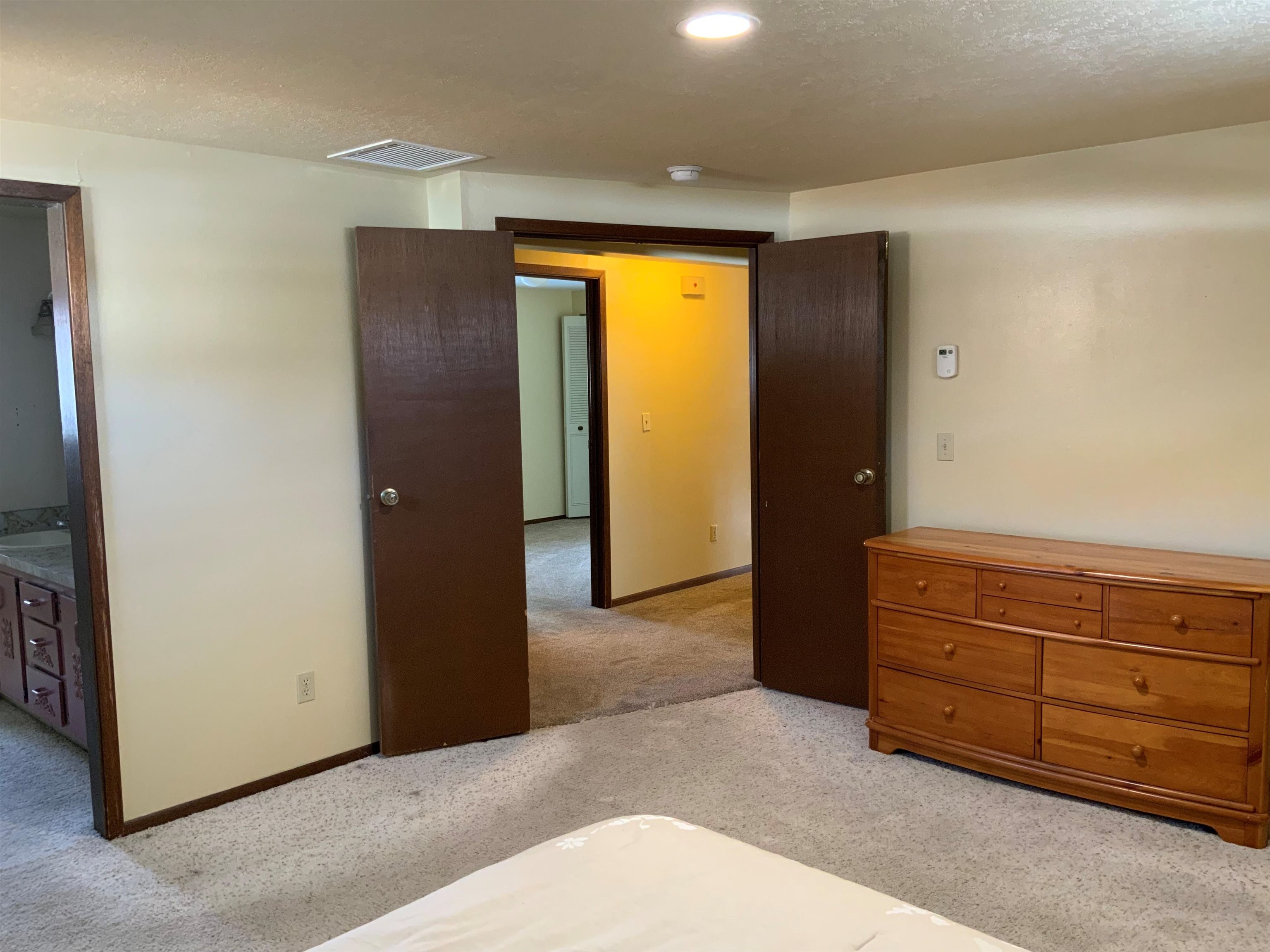 734-36 36 3/10 Road Palisade, CO 81526 - Photo 21 of 39 a view of an empty room with cabinet and closet area