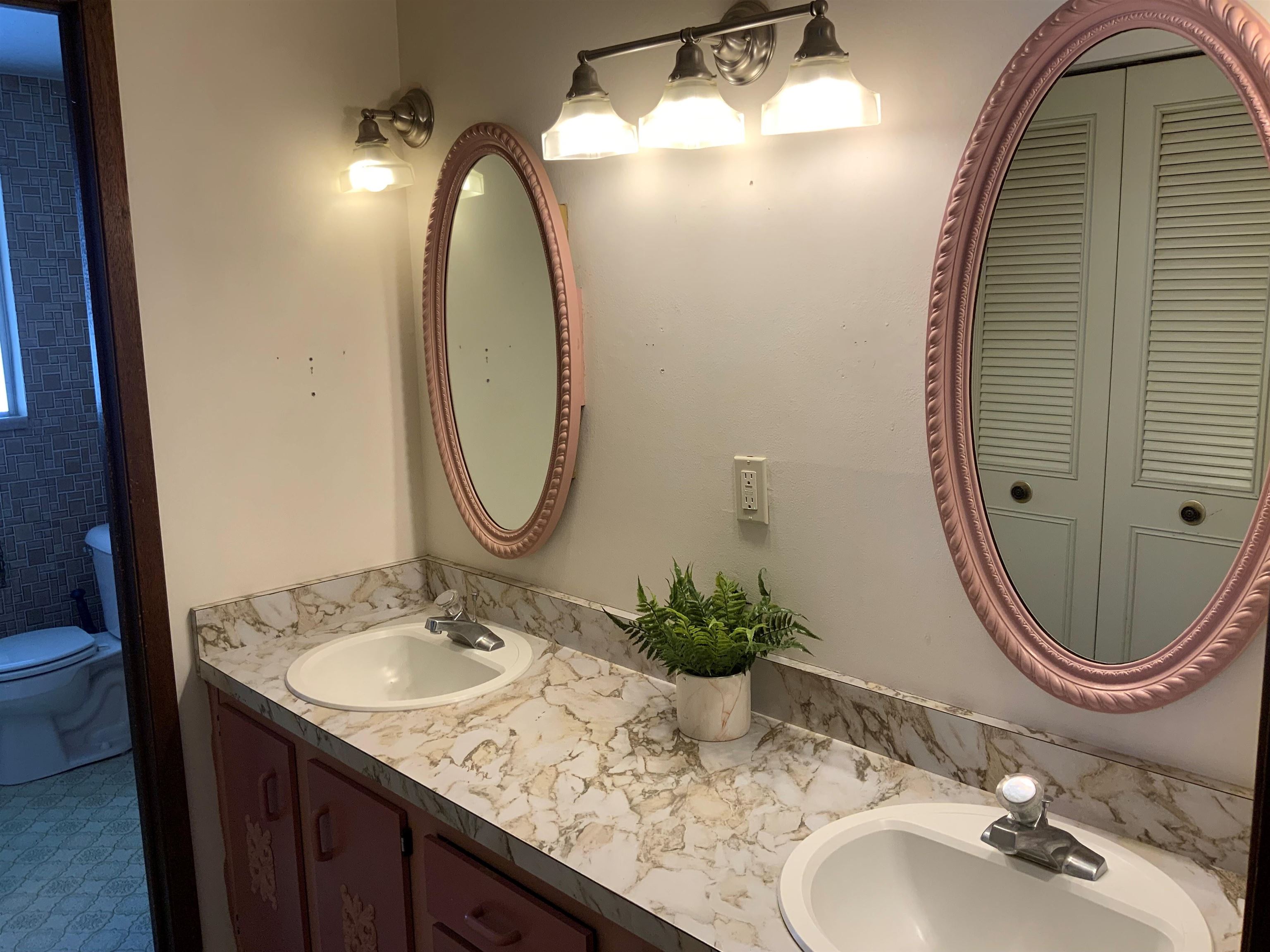734-36 36 3/10 Road Palisade, CO 81526 - Photo 22 of 39 a bathroom with a granite countertop sink and a mirror