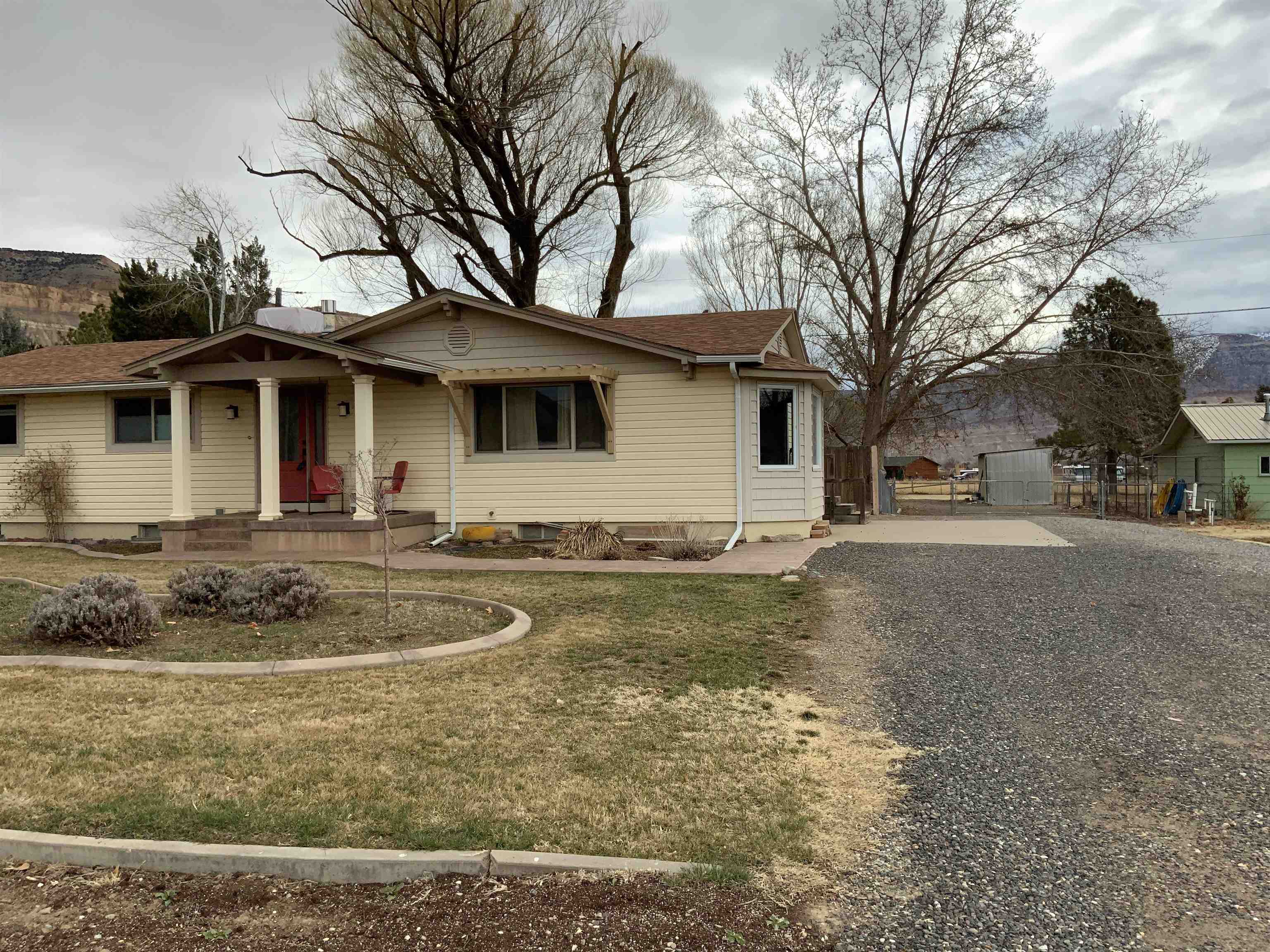 734-36 36 3/10 Road Palisade, CO 81526 - Photo 29 of 39 a front view of a house with garden