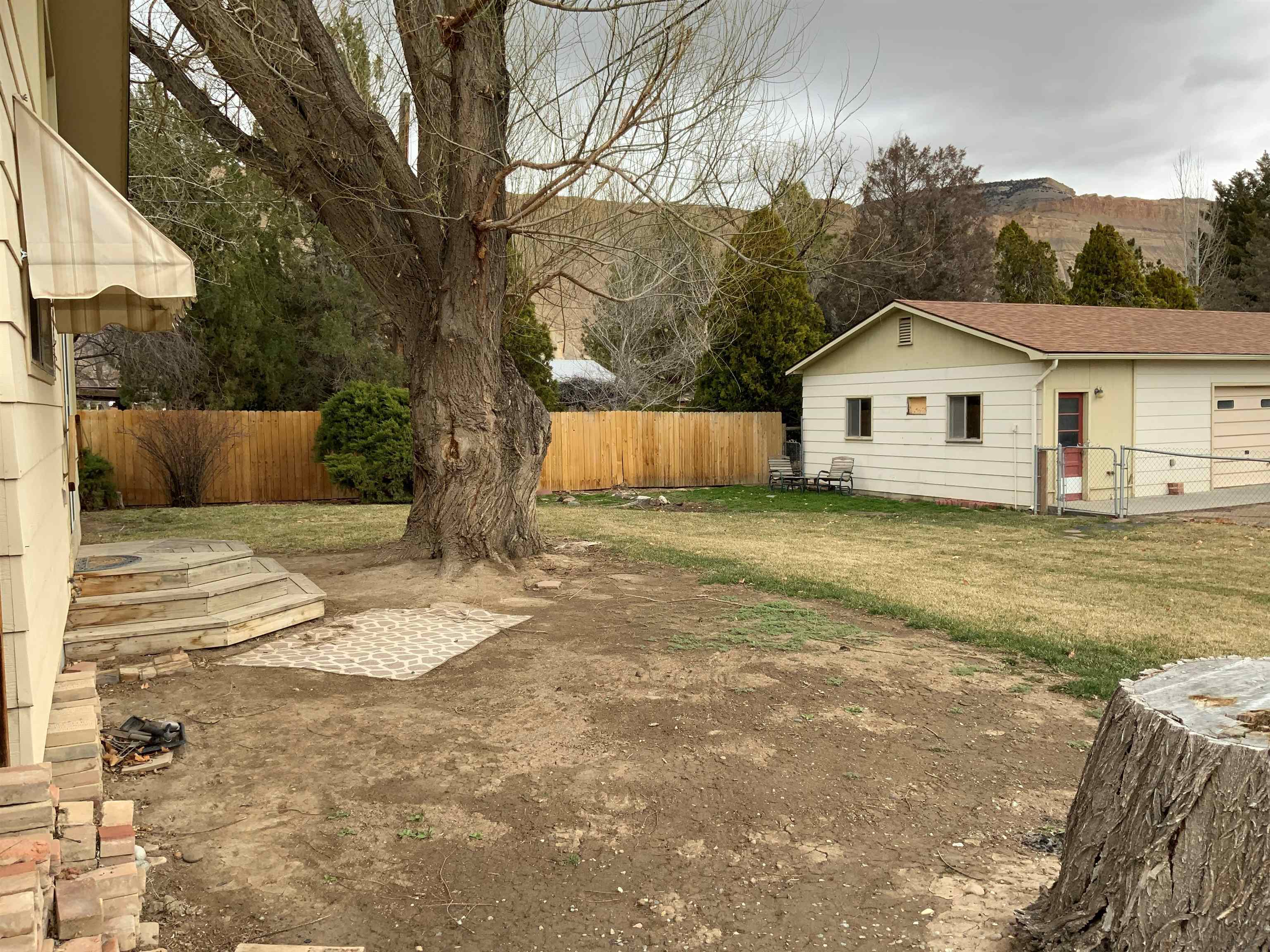 734-36 36 3/10 Road Palisade, CO 81526 - Photo 33 of 39 a view of a house with a yard