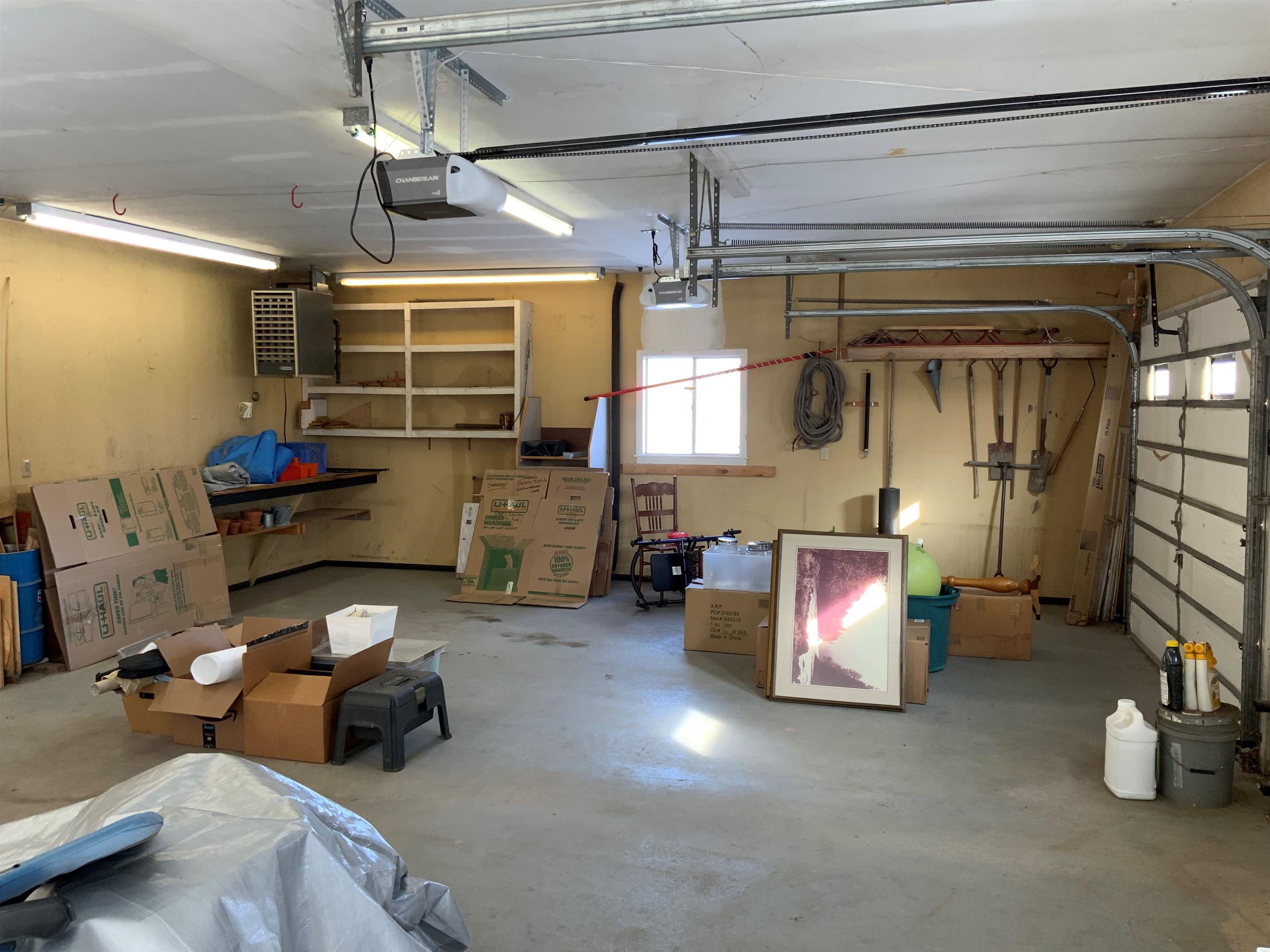 734-36 36 3/10 Road Palisade, CO 81526 - Photo 36 of 39 a garage with furniture and a ceiling fan